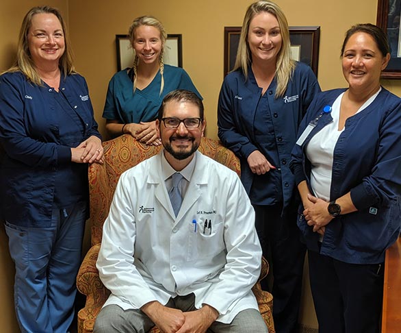 Freeman, M.D. with his Staff